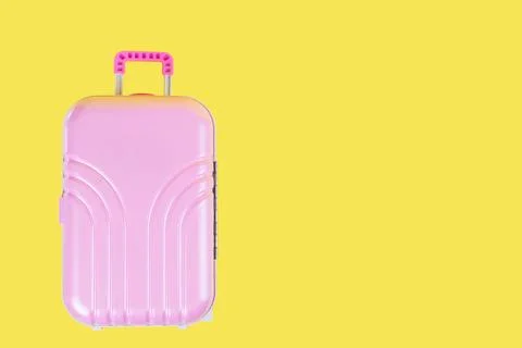 Stylish suitcase on color background. Space for text Stock Photos