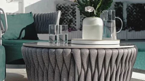 Stylish table made of fabric weaving with a porcelain stoneware top Vídeos de archivo 220772146
