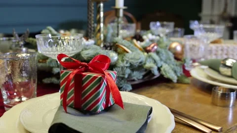 Stylish table setting close-up on Christmas Eve and gifts for family members on  Stock-Footage 220331020