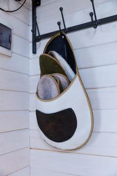 Stylish Wall-Hanging Storage Solution for Comfortable Footwear in Rustic Designs Stock Photos