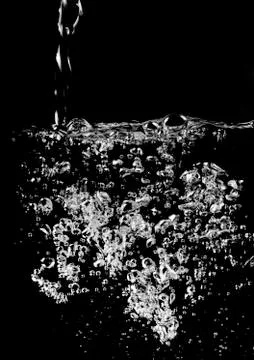 Stylish water splash Stock Photos