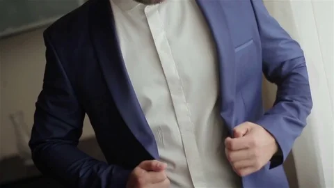 Stylish well-dressed man in blue suit buttons jacket no face close-up Stock Footage 72373157