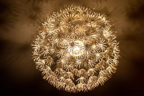 Stylish white ceiling light with beautiful shadows on the ceiling Stock Photos