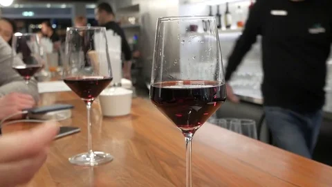 Stylish wine glasses on a bar Stock Footage 84638967