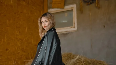 Stylish woman posing in barn Stock Footage 118964989
