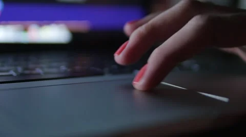 Stylish women's hand on the touchpad computer. Move and click Stock Footage 56531468
