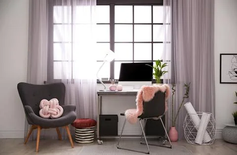 Stylish workplace with computer near window at home office. Space for text Stock-Fotos