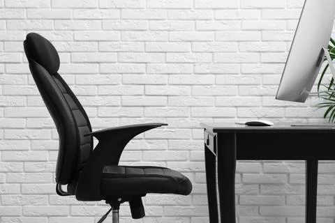 Interior of modern office with chairs at desk stock photo