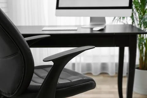 Interior of modern office with chairs at desk stock photo