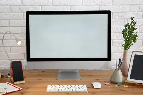 Stylish workplace with modern computer on desk Stock-Fotos