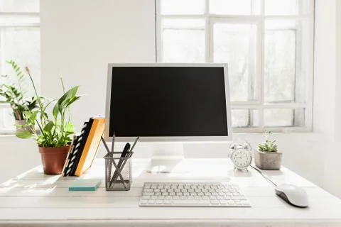 Stylish workspace with computer at home or studio Foto stock