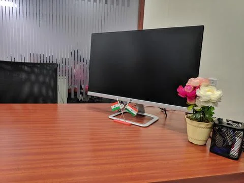 Stylish workspace with desktop computer, office supplies, houseplant and book Stock Photos