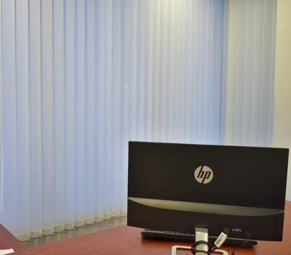 Stylish workspace with desktop computer, office supplies, houseplant and book Stock Photos