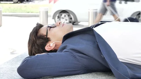 Stylish Young Business Man witih Earphones Stock Footage