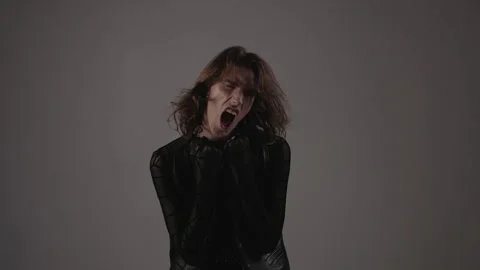 Stylish Young Man Model Posing In Studio. Man Who Shouts. Vidéo 277597043