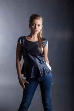 Stylishly dressed model posing in studio Stock Photos