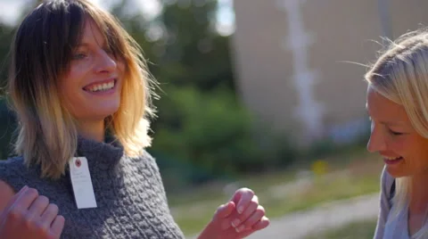 Stylist and assistant dressing up model smiling in camera Video stock 59738734