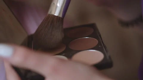 Stylist does makeup for the bride Stock Footage 168008475