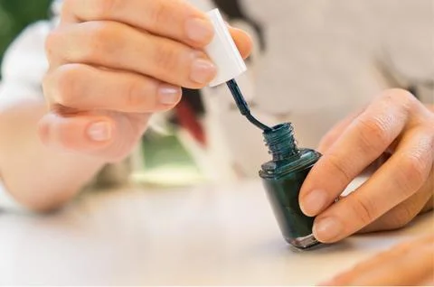 Stylist doing manicure Stock Photos