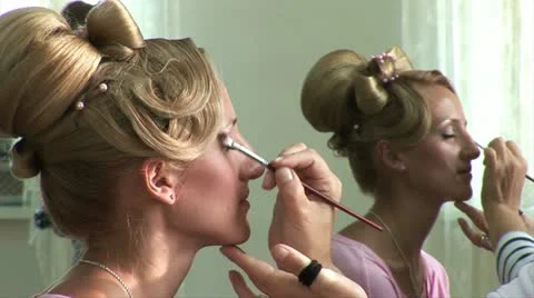 The stylist imposes a make-up to the bride Stock Footage 11395520