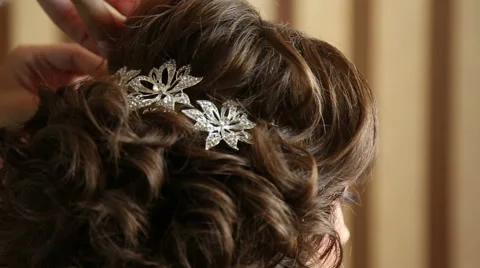 Stylist makes hairstyle model Stock Footage 53961333