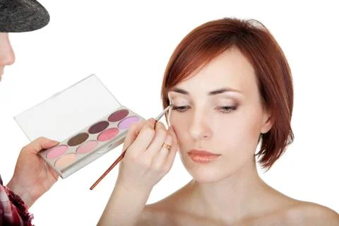Stylist makes makeup. Stock-Fotos