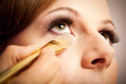 Stylist Making Up The Bride Stock Photos