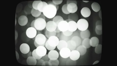 Stylize the video under the old kinescope screen. Blurred Christmas lights. Stock Footage 170176645