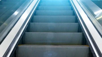 Stylized Ascending Escalator into Bright Lens Flare Shine, Blue Light Streaks Stock Footage 86141402