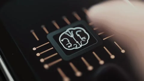 Stylized brain glows on a dark microchip surrounded by copper circuit contacts Stock Footage 343374488