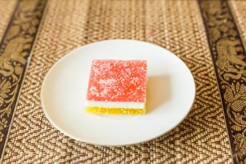 Stylized candy on white plate 写真素材