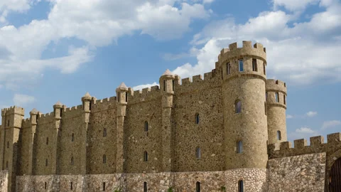 Stylized castle on a cloudy sky background, time lapse scene Stock Footage 148835625