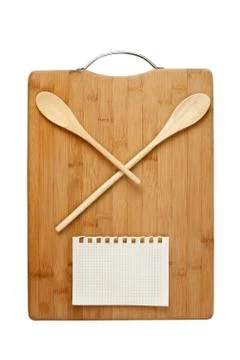 Stylized clock - cutting board and wooden spoons Stock Photos