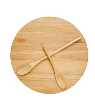 Stylized clock - cutting board and wooden spoons isolated on a white backgrou Stock Photos