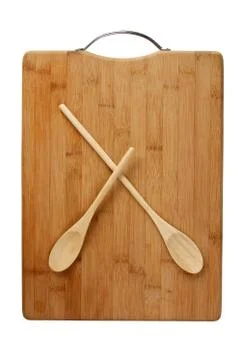 Stylized clock - cutting board and wooden spoons isolated on a white backgrou Stock Photos