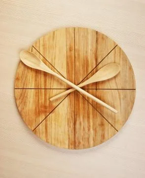 Stylized clock - cutting board and wooden spoons Stock Photos