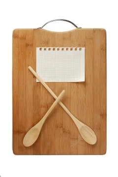 Stylized clock - cutting board and wooden spoons Stock Photos