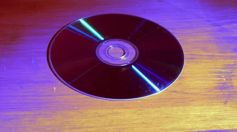 Stylized DVD disc slides into view Video stock 50904115