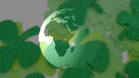 Stylized globe rotating and fading after soft green reveal, revealing glitter Stock Footage 329505531