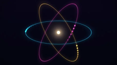 A stylized glowing atom model featuring orbiting light trails and a central.. Stock-Footage 347465162