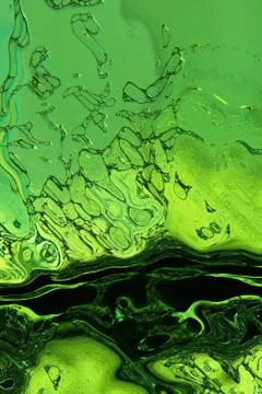 Stylized green liquid texture as abstract background. Illustrazione stock