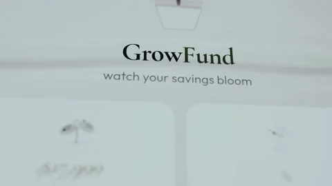 Stylized illustration of a tree with text GrowFund watch your savings bloom Stock Footage 335897840