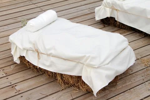 Stylized straw bale sofa. Stock Photos