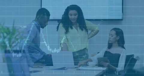 Stylus tapping tablet initiating dynamic data overlay over table while team Stock Footage 327450777