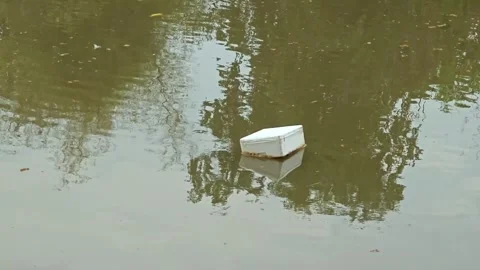 Styrofoam Crate floating in the river. Stock Footage 307593477