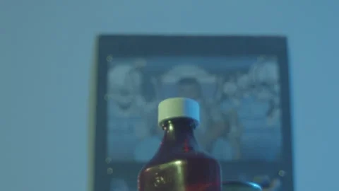 Styrofoam Cup Beverage and Codeine Bottle Stock Footage 241757475