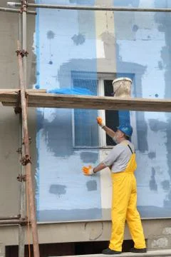 Styrofoam facade insulation, installing mesh Stock Photos