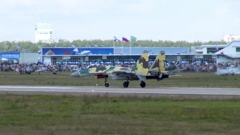 Su-35 (Flanker-E) fighter of generation 4 plus plus steers along runway. Stock Footage 120682283