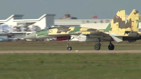 Su-35 (Flanker-E plus) multirole fighter jet moves down runway after landing Stock Footage 205201294