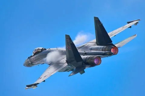 Su-35 performing aerobatics. Stock Photos